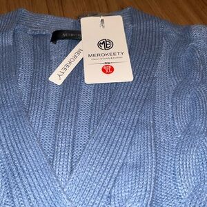 Merokeety cable cardigan. Size x large but runs very small. Have two